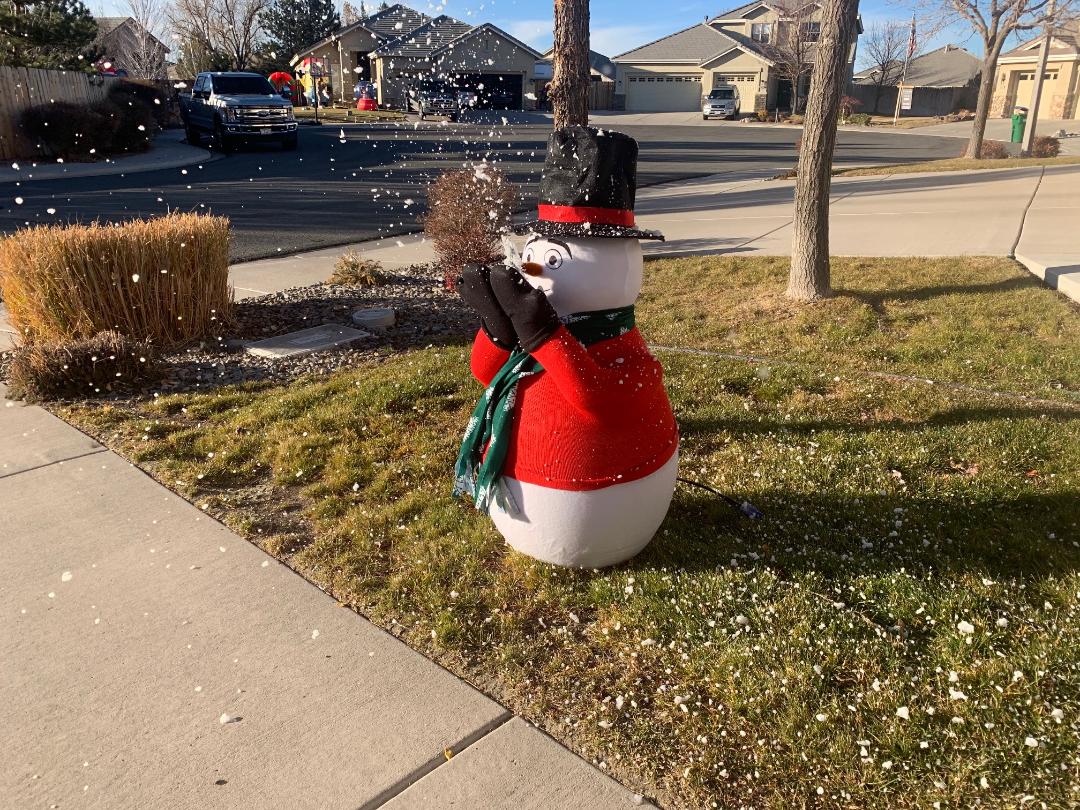 snowman holiday snow machine